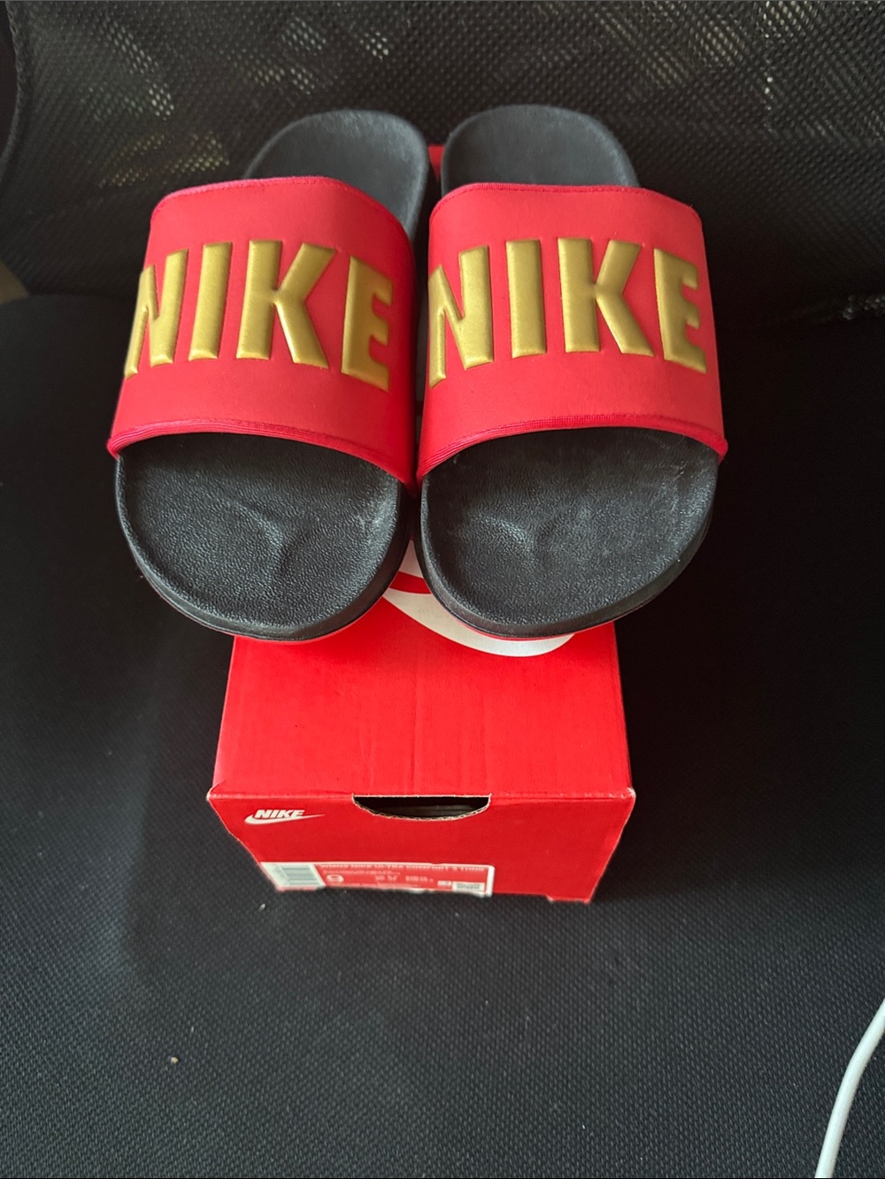 Nike Women’s Red Slides with Gold Logo